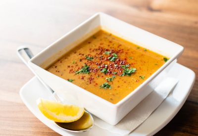 Red Lentil Soup - traditional Turkish recipe, onion, potatoes, carrots, flour